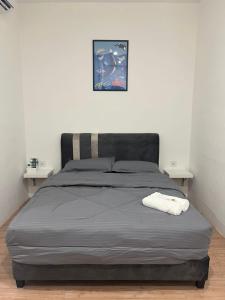 Postel nebo postele na pokoji v ubytování KIWI INN