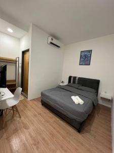 Postel nebo postele na pokoji v ubytování KIWI INN