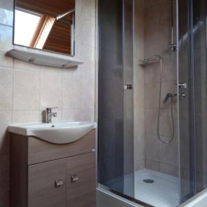Kúpeľňa v ubytovaní Strandi Apartmanok- Boglárka