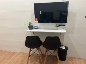 TV a/nebo společenská místnost v ubytování KIWI INN