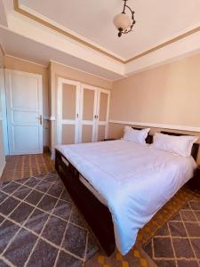 Tempat tidur dalam kamar di Villa Dune Rouge de la Siesta