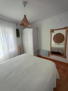 Katil atau katil-katil dalam bilik di Azahares Apartamento turístico