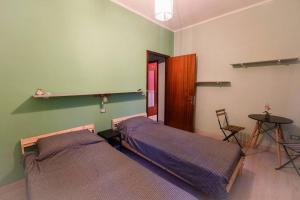 Postel nebo postele na pokoji v ubytování Casa Monet