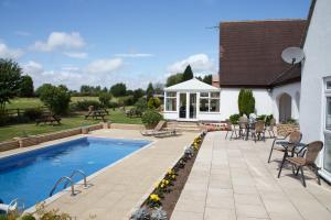 The swimming pool at or near Badgers Mount Hotel 