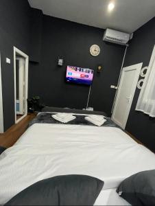 Cama ou camas em um quarto em London.Apartments