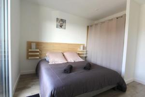 Postel nebo postele na pokoji v ubytování Gîte de l'Estuaire classé 3 étoiles