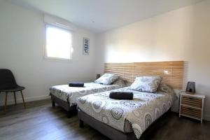 Postel nebo postele na pokoji v ubytování Gîte de l'Estuaire classé 3 étoiles