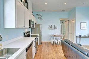 a kitchen with a sink and a counter top at Mary Lou's Hideout (11th St Bungalows #19) in Port Aransas +30 photos