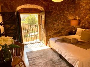 Postel nebo postele na pokoji v ubytování HOTEL MINA REAL