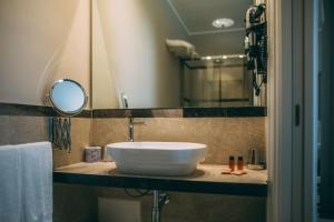 Vannituba majutusasutuses La Dépendance Hotel