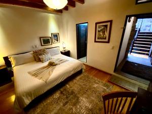 Postel nebo postele na pokoji v ubytování HOTEL MINA REAL