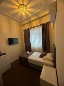 Cama o camas de una habitación en Konak otel