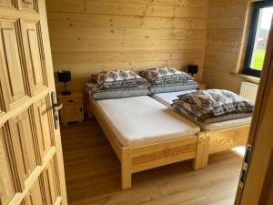 Orawska Knieja 2.0客房内的一张或多张床位