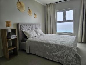 Кровать или кровати в номере Seaview Resort Boca Sami
