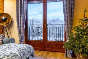 Posteľ alebo postele v izbe v ubytovaní Apartamenty widokowe U Homera