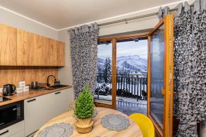Výhľad na hory alebo výhľad na hory priamo z apartmánu