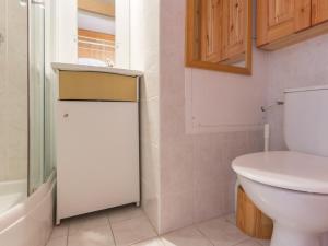 a bathroom with a toilet and a sink at Studio La Rosière, 1 pièce, 4 personnes - FR-1-275-144 in La Rosière