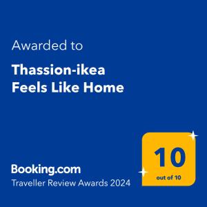 Ett certifikat, pris eller annat dokument som visas upp på Thassion-ikea Feels Like Home