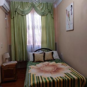 Postel nebo postele na pokoji v ubytování Camellia + 7 fotografií