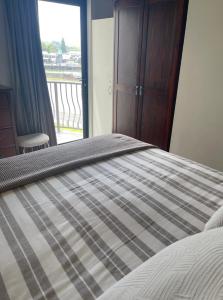 Katil atau katil-katil dalam bilik di Tide at Gisborne Port