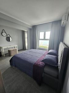 Katil atau katil-katil dalam bilik di Seaview Resort Boca Sami