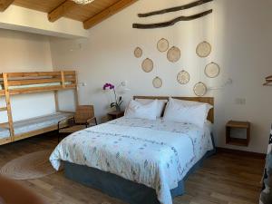 Ένα ή περισσότερα κρεβάτια σε δωμάτιο στο Torremana +110 φωτογραφίες