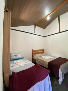 Postel nebo postele na pokoji v ubytování Hospedagem Vilella da Serra
