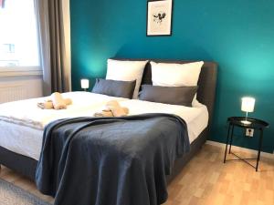 Säng eller sängar i ett rum på LIME HOMES: Küche, Balkon, Netflix