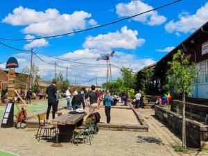 a group of people walking around a park at 3 bedroom House very close to Paris in Pantin