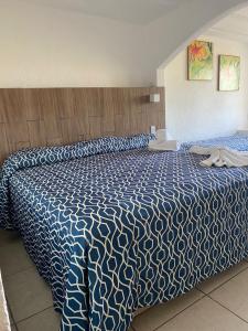 Postel nebo postele na pokoji v ubytování Hotel Torre Molino + 15 fotografií