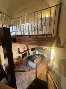 an overhead view of a living room with a bed at Locus Amoenus in Matera