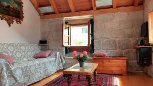 a living room with a couch and a table at Apartment Korcula Town in Korčula