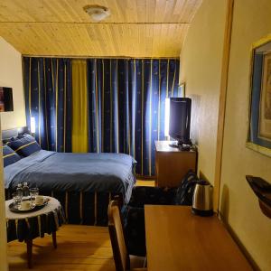 Ένα ή περισσότερα κρεβάτια σε δωμάτιο στο Vila Dubysa