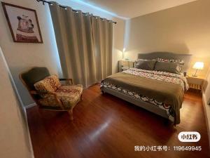 Säng eller sängar i ett rum på Tao house