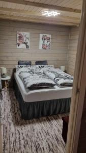 Кровать или кровати в номере Sydalen house