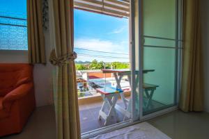 Balkón nebo terasa v ubytování Lotus Suite Hua Hin