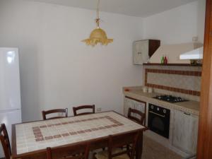A kitchen or kitchenette at La Mandola Még 37 kép