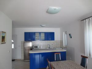 Kuchyň nebo kuchyňský kout v ubytování Apartments Kovacic
