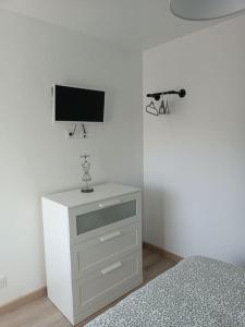 TV a/nebo společenská místnost v ubytování Gîte à Travers champs