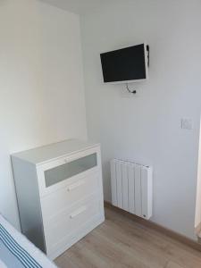 TV a/nebo společenská místnost v ubytování Gîte à Travers champs