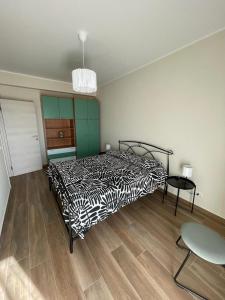 Кровать или кровати в номере Residence Guttuso