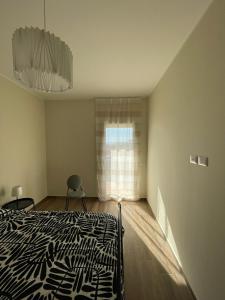 Кровать или кровати в номере Residence Guttuso