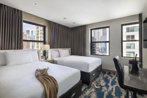 Voodi või voodid majutusasutuse Hotel Felix toas