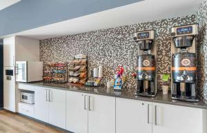 a kitchen with a counter with a coffee maker on it at Extended Stay America Premier Suites - Fredericksburg in Fredericksburg