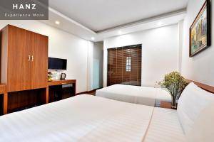 Voodi või voodid majutusasutuse S79 Ami Hotel toas
