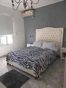 Postel nebo postele na pokoji v ubytování Casa de campo Villa Elisa