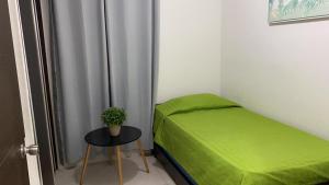 Postel nebo postele na pokoji v ubytování Playa La Barqueta , Las Olas Tower Front