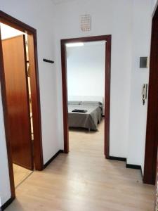 a room with a door leading to a bedroom at Red_Cross.Rent_Appartament in Palermo