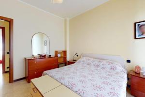 Кровать или кровати в номере Vicino Fiera Milano Rho, appartamento,2-4 posti