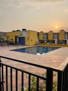 a view of the pool from the balcony of a building at Hermosa casa in Cúcuta